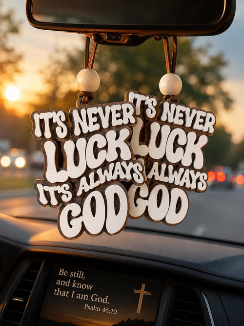 Laser engraved wood car charm with It's Never Luck It's Always God groovy retro quote hanging from rearview mirror