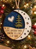 Laser engraved memorial Christmas ornament with crescent moon pine tree heart and the sky looks different quote
