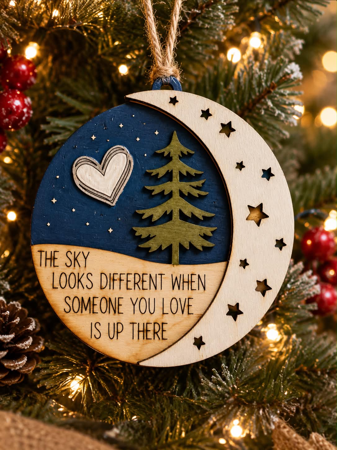 Laser engraved memorial Christmas ornament with crescent moon pine tree heart and the sky looks different quote