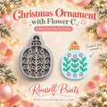 Christmas Ornament with Flower C Physical Clay Cutter by Roussell Prints – ornament shape with floral branch cutout and finished clay example in blue with green and pink accents